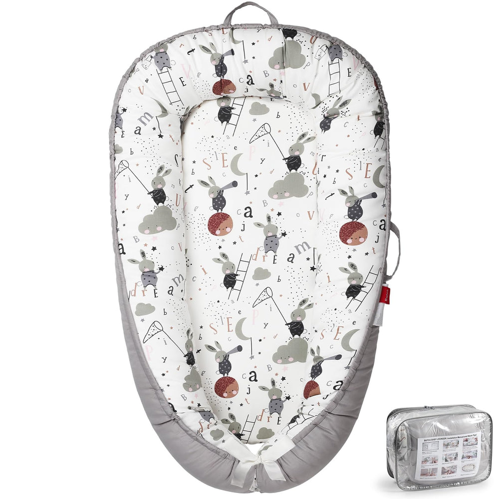 BUTOA Baby Lounger top view showing breathable cotton cover for cozy newborn moments