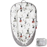 BUTOA Baby Lounger top view showing breathable cotton cover for cozy newborn moments