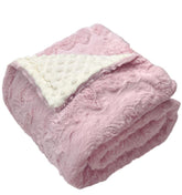 Buttzo baby blanket pink dot close-up shows plush minky texture for cozy snuggles.