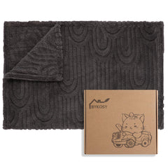 BYKOSY Ultra Soft Fleece Baby Blanket folded in nursery, ideal for cuddles and photo shoots.