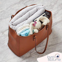 Byrd and Blume round baby play mat gray portable carry bag for easy storage.