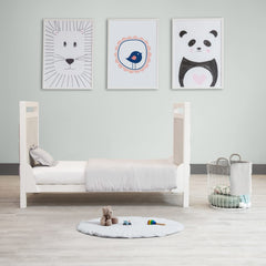 Byrd and Blume round baby play mat gray tummy-time setup with soft organic padding.