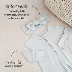 Caden Lane headwrap showing stretchy fit for growth from newborn to toddler.