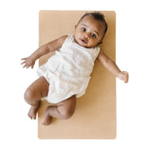 Cairn vegan leather baby changing mat folded compact for easy travel storage.