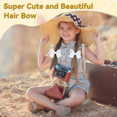 Calluace white bows worn in ponytail demonstrating quick daily styling