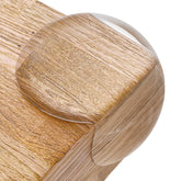 CalMyotis corner protector on a table edge, discreet babyproofing solution.