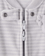 Carter's sleep bag fabric close-up shows soft, cozy polyester for gentle naps.