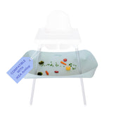 Catchy Food Catcher installed on an IKEA Antilop chair prevents spills.