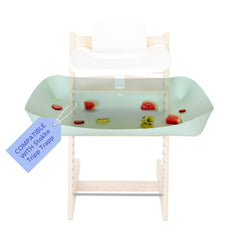 Catchy food catcher installed on Stokke Tripp Trapp catching dropped food to protect floors