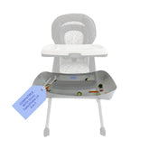 Catchy Food Catcher attached to Graco Table2Table LX during meals reduces mess.