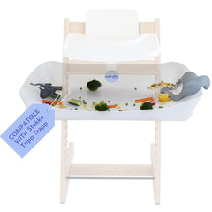Catchy Food Catcher on Tripp Trapp attachment keeps meals tidy and contained.