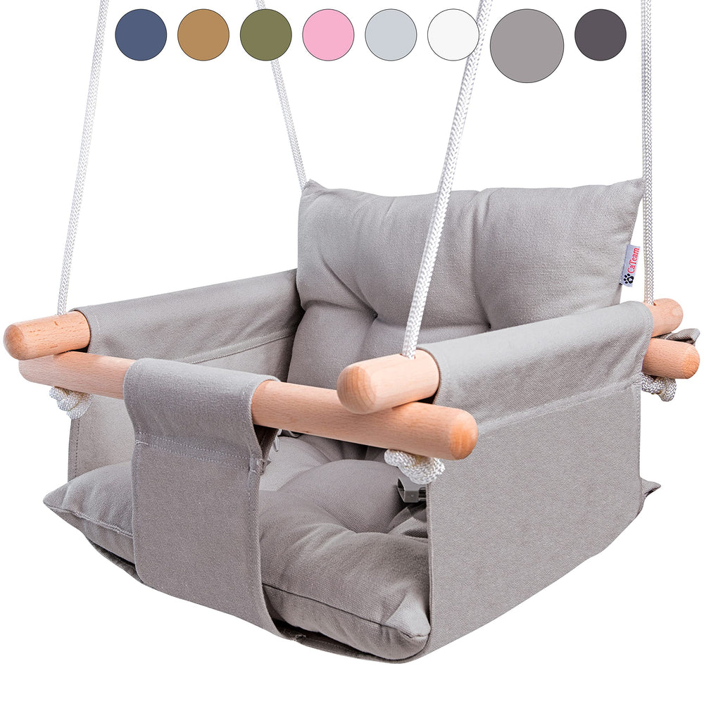 Cateam canvas baby swing seat showing a secure, cozy indoor setup.