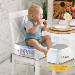 CAVWVTYU booster seat side pockets hold wipes and toys within reach.