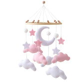 Ceecolia gray pink cloud moon mobile assembly shows handmade charm for a cozy nursery ambiance.