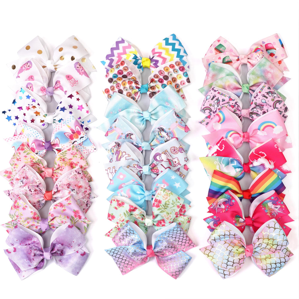 CellElection unicorn-pattern bows with clips add bright unicorn flair to daily hairstyles.