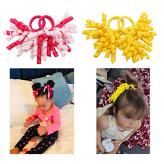 CellElection baby hair ties in pairs ideal for matching outfits and occasions.
