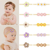 CellElection daisy headbands close-up showing 1-inch flowers on soft nylon band for gentle wear.