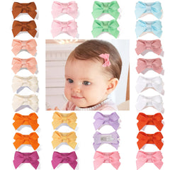 CellElection mini bow clip closeup highlights tiny size perfect for fine baby hair.