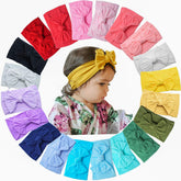 CÉLLOT soft-knit headband close-up showing gentle material for delicate scalps.