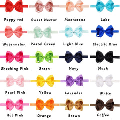 CÉLLOT grosgrain bow headband in pastel pink adds playful charm