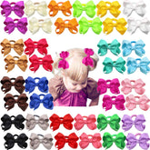 CÉLLOT boutique 3-inch red hair bow with elastic tie ideal for toddler ponytails and playtime.