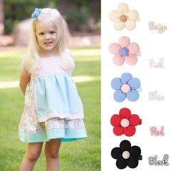 CÉLLOT flower clip red adds vibrant accent to hairstyles.