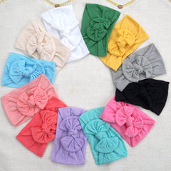 CÉLLOT knot headband with bow in assorted colors for comfy photos