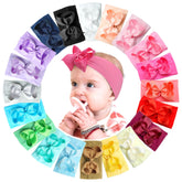 Celllot nylon headband with bow closeup shows soft, stretchy comfort for newborns.
