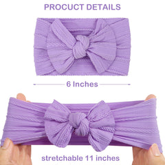 CÉLLOT nylon-elastic baby headband with bows; gentle on delicate scalps.