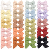 CÉLLOT linen hair bows close-up highlighting premium fabric texture for daily wear