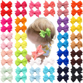 CÉLLOT 2-inch baby bows clip provides gentle, secure attachment for delicate hair.