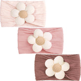 CÉLLOT baby flower headband pink close-up, showing soft nylon-spandex stretch for gentle all-day wear