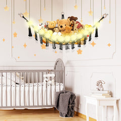 CERETIA stuffed animal hammock corner installation demonstrates space-saving storage in a kid's room.