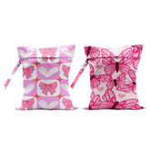 CFGBFDGH pink bow wet bag with handle for travel organization and reusable laundry separation.