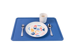 Chamos sapphire and gray placemats add color while encouraging organized dining.