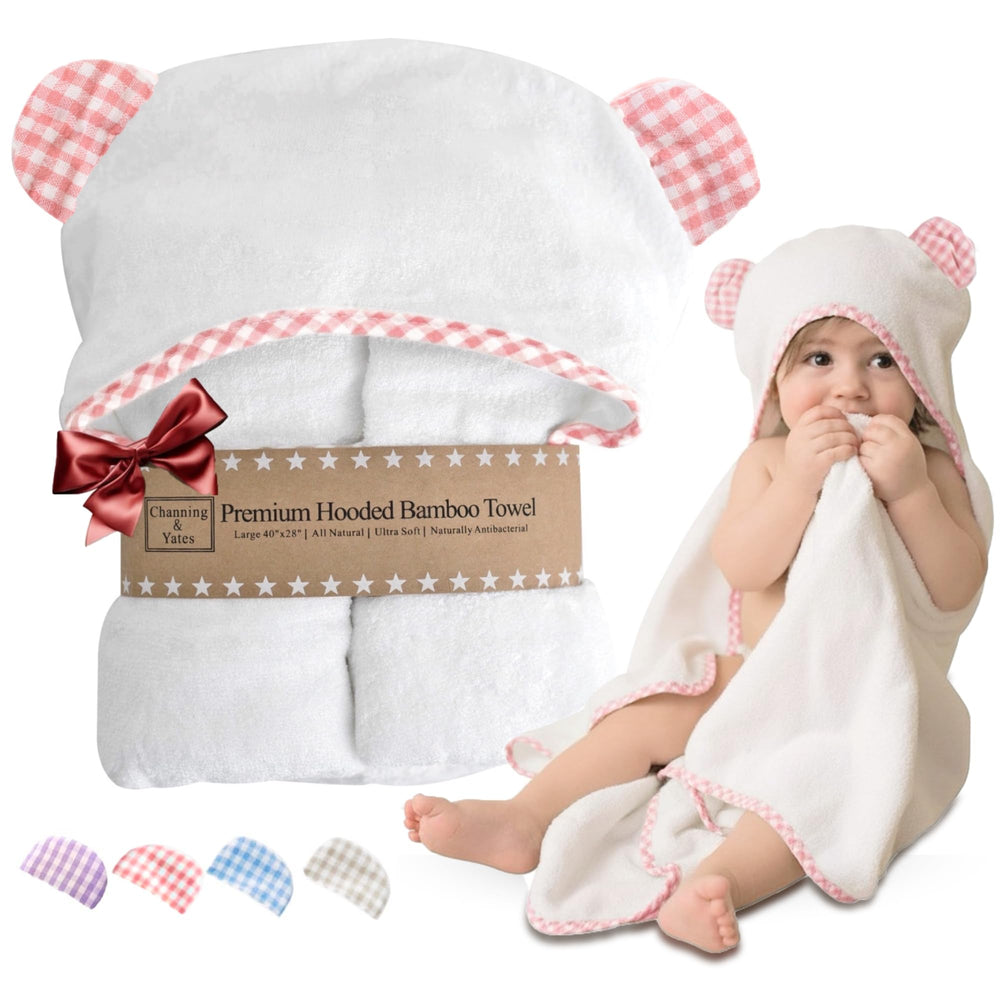 Channing & Yates hooded pink baby towel is ultra-soft and absorbent.