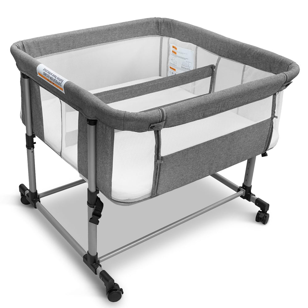 Cheermomo twin bassinet side view showing compact bedside setup for twins