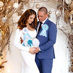 Cheerupp dad-to-be corsage pin complements family photo moments.