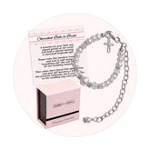 Cherished Moments Babe to Bride cross bracelet close-up beads highlights craftsmanship for a baby keepsake