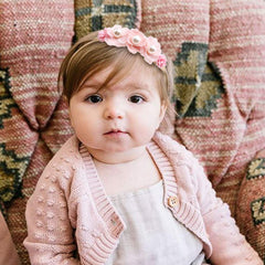 Cherrboll non-slip flower headbands stay in place during play and photos.
