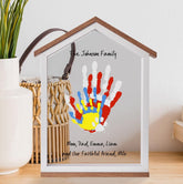 CHERRY CHEERS house-shape frame showing a family handprint keepsake for wall display.