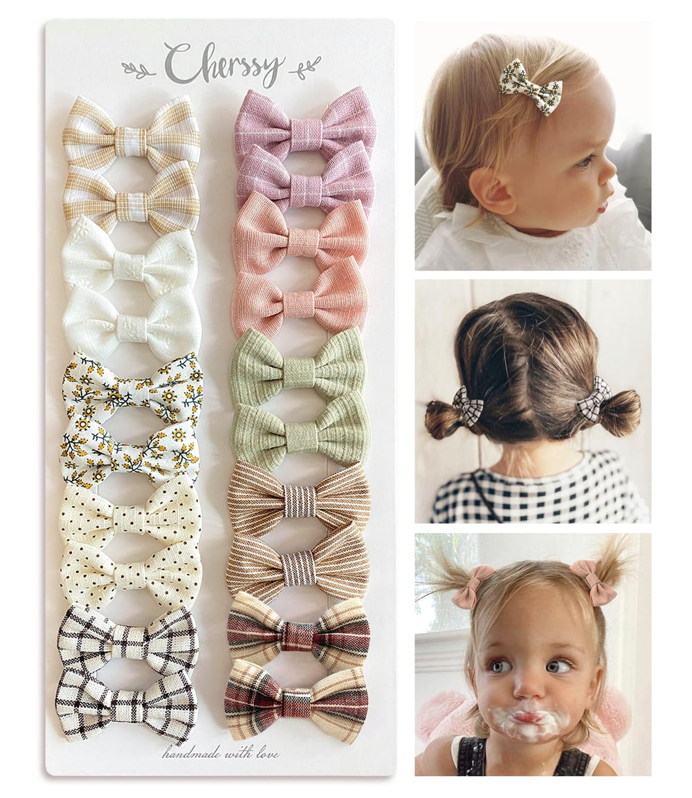 Cherssy baby hair bow clip with soft fabric texture provides gentle hold for fine hair.