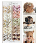 Cherssy baby hair bow clip with soft fabric texture provides gentle hold for fine hair.