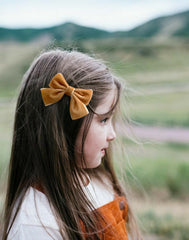 Cherssy Christmas velvet bow clip in festive burgundy tone for easy everyday wear.