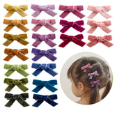 Cherssy Velvet Mini Bows packaged in neutral tones for versatile baby outfits.