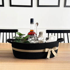 CHICVITA Black woven basket used for toy organization in nursery