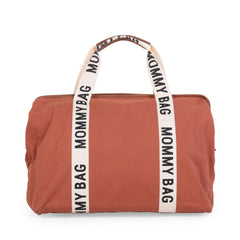 Childhome Signature Mommy Bag water-repellent fabric resists spills during travel.