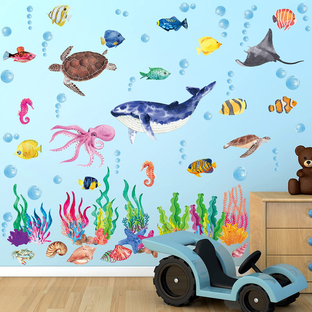 Chinco ocean decals featuring whales add a playful underwater vibe to kids' room.