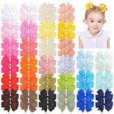 Choicbaby mini hair bows 2.3 inches in 60 color options for coordinating outfits.