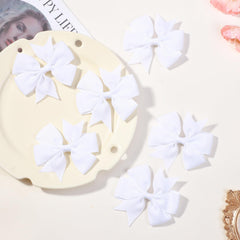 Choicbaby white grosgrain bow closeup showing durable clip and ribbon construction